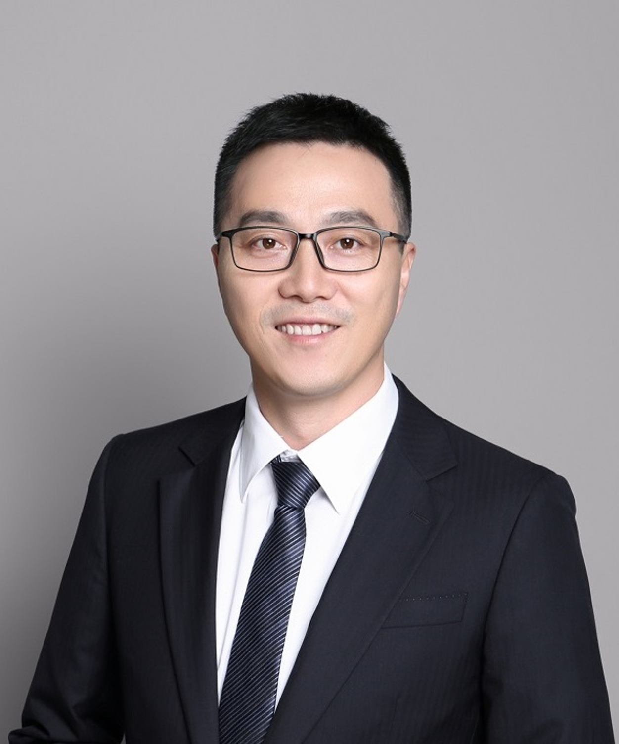 Yuan Shen smiling into the camera