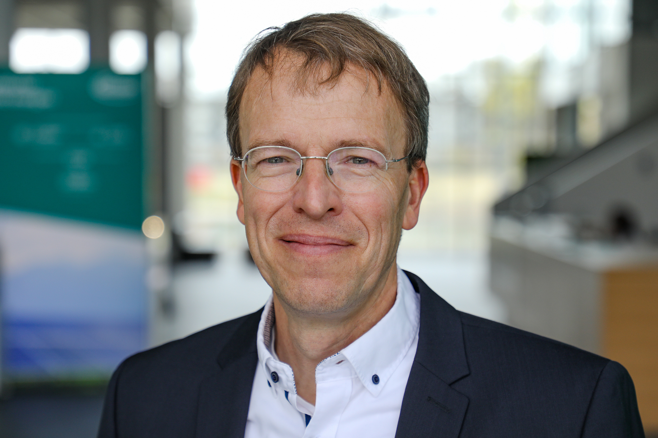 Tim Gutheit smiling directly into the camera