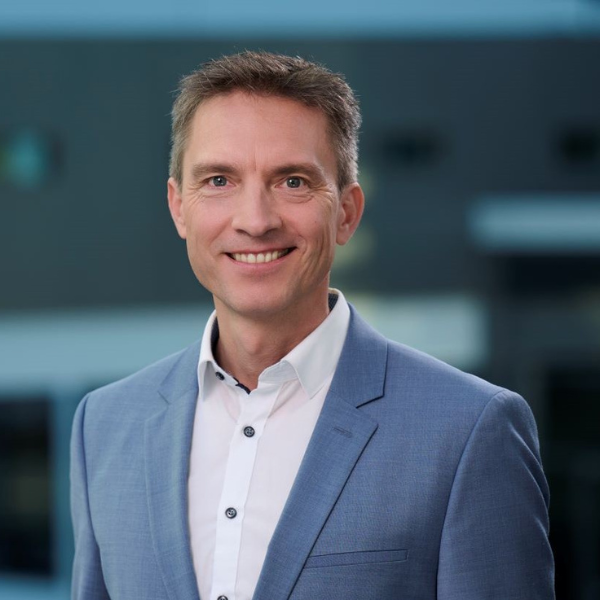 Waldmann smiling into the camera.